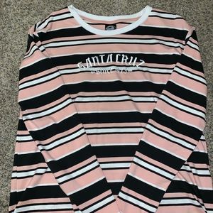 black and pink striped Santa Cruz shirt